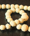Copy of a commonplace style of medieval prayer beads carved from cattle bone. Size: each bead approx. 8-12mm diameter